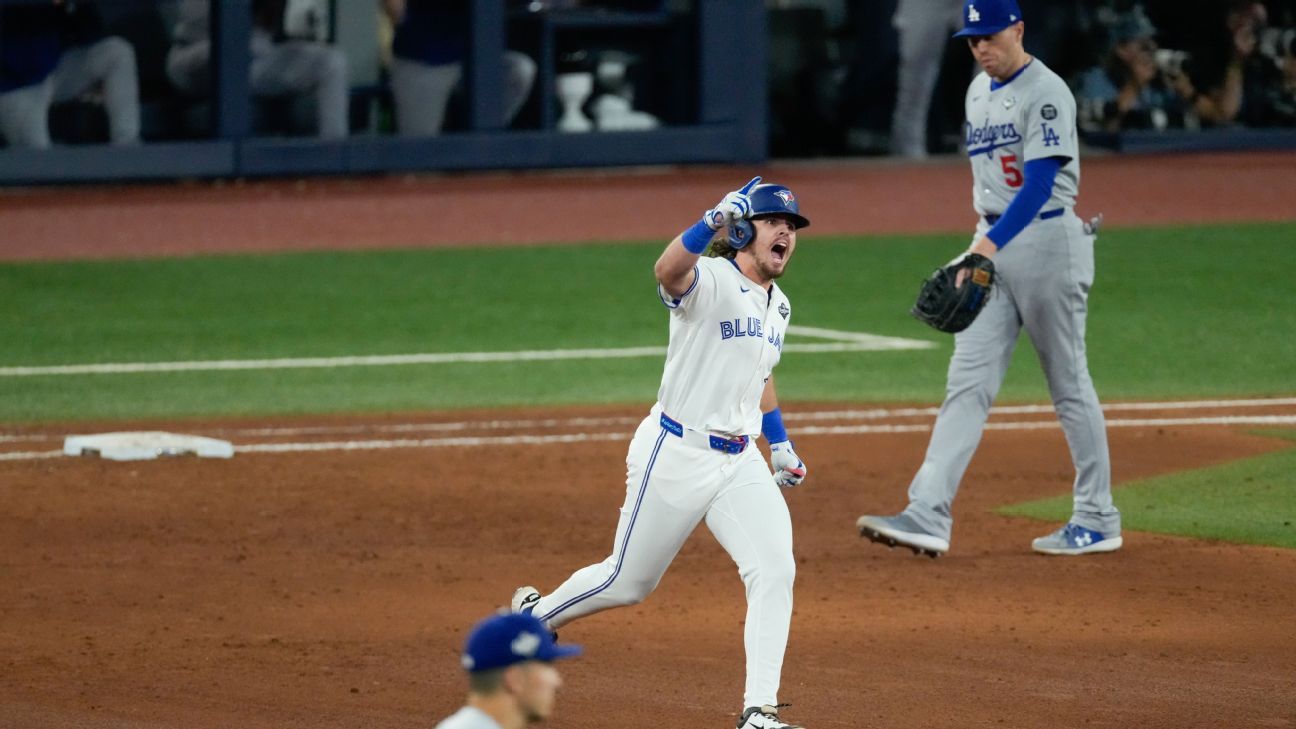 Jays use 9-run 6th to stomp Dodgers in Game 1