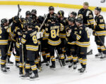 Swayman leads the Bruins past the Red Wings 3-2 in a shootout