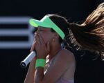 Australian Open player comes to aid of collapsing ball girl during record-breaking win