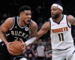 Bucks' Giannis Antetokounmpo expects to miss extended time after injuring his calf again