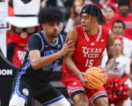 JT Toppin scores 27 points to lead No. 15 Texas Tech to an 84-71 victory over No. 11 BYU