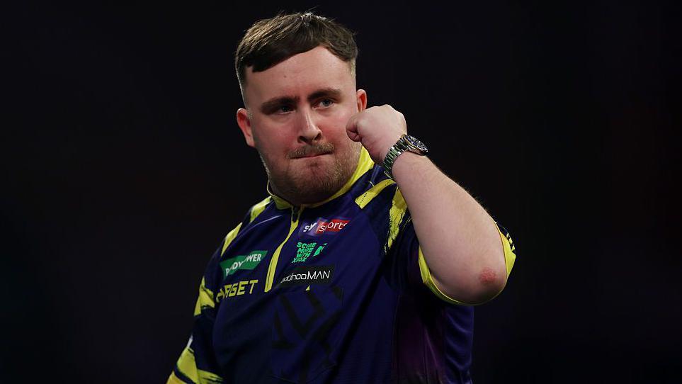 Luke Littler: World champion beats veteran Paul Lim in Bahrain