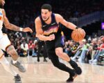 Suns' Booker exits loss after rolling right ankle