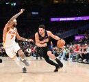 Suns' Booker out at least week with ankle sprain