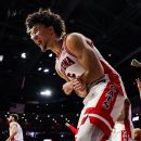 Unbeaten Huskers to fans: Quit storming court