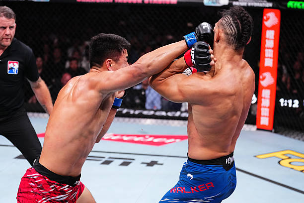 Johnny Walker’s Calf Kicks Seal Jaw-Dropping TKO Against Mingyang Zhang – UFC Shanghai Highlights