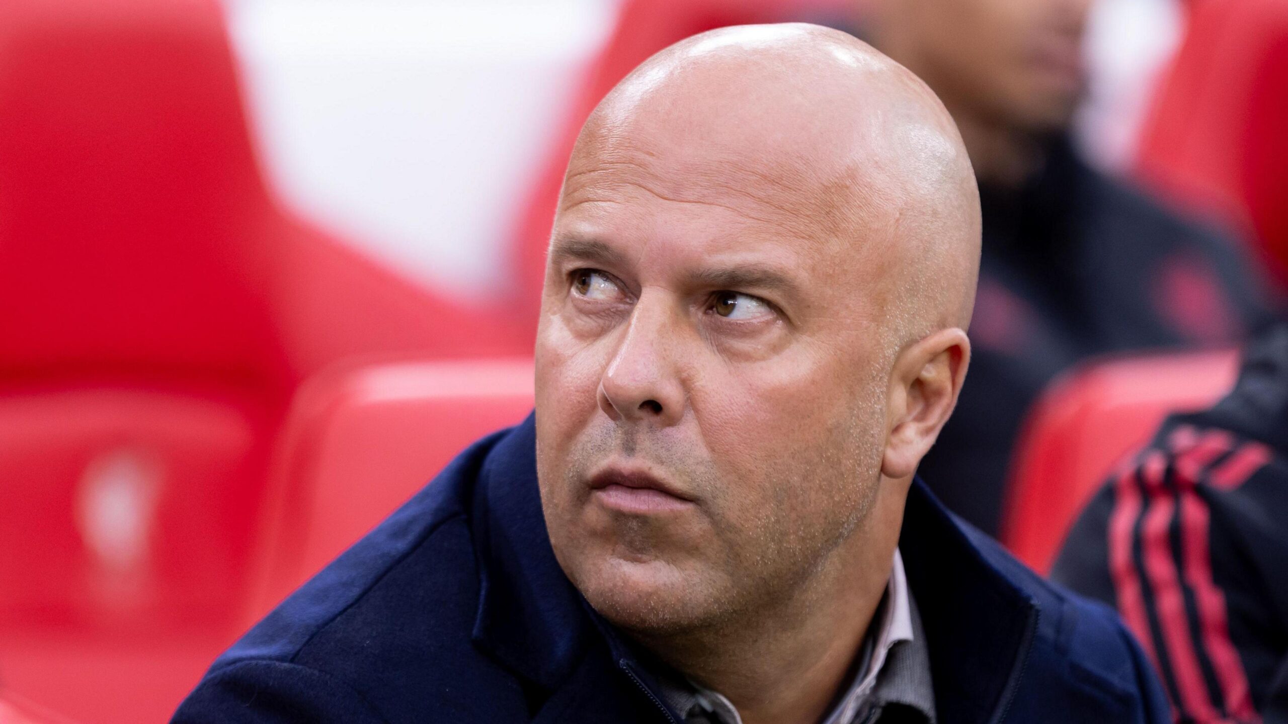 What are the key questions facing Liverpool boss Slot?