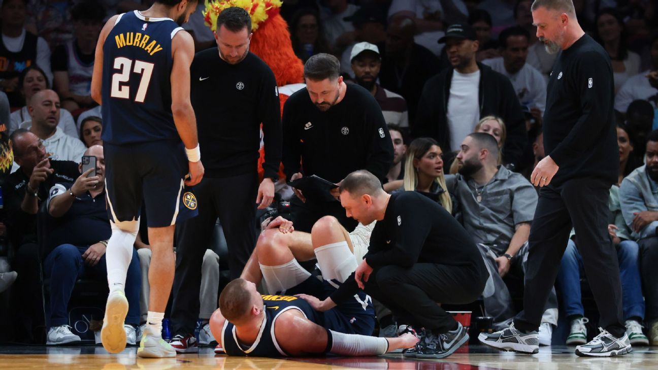Nuggets’ Jokic hobbles off the court following knee injury