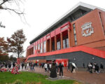 Why are the queues to enter Anfield growing?