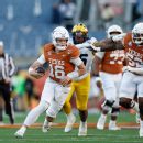 Manning’s 60-yard TD run seals Horns’ Citrus win