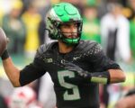 QB Moore opts against draft, returning to Ducks