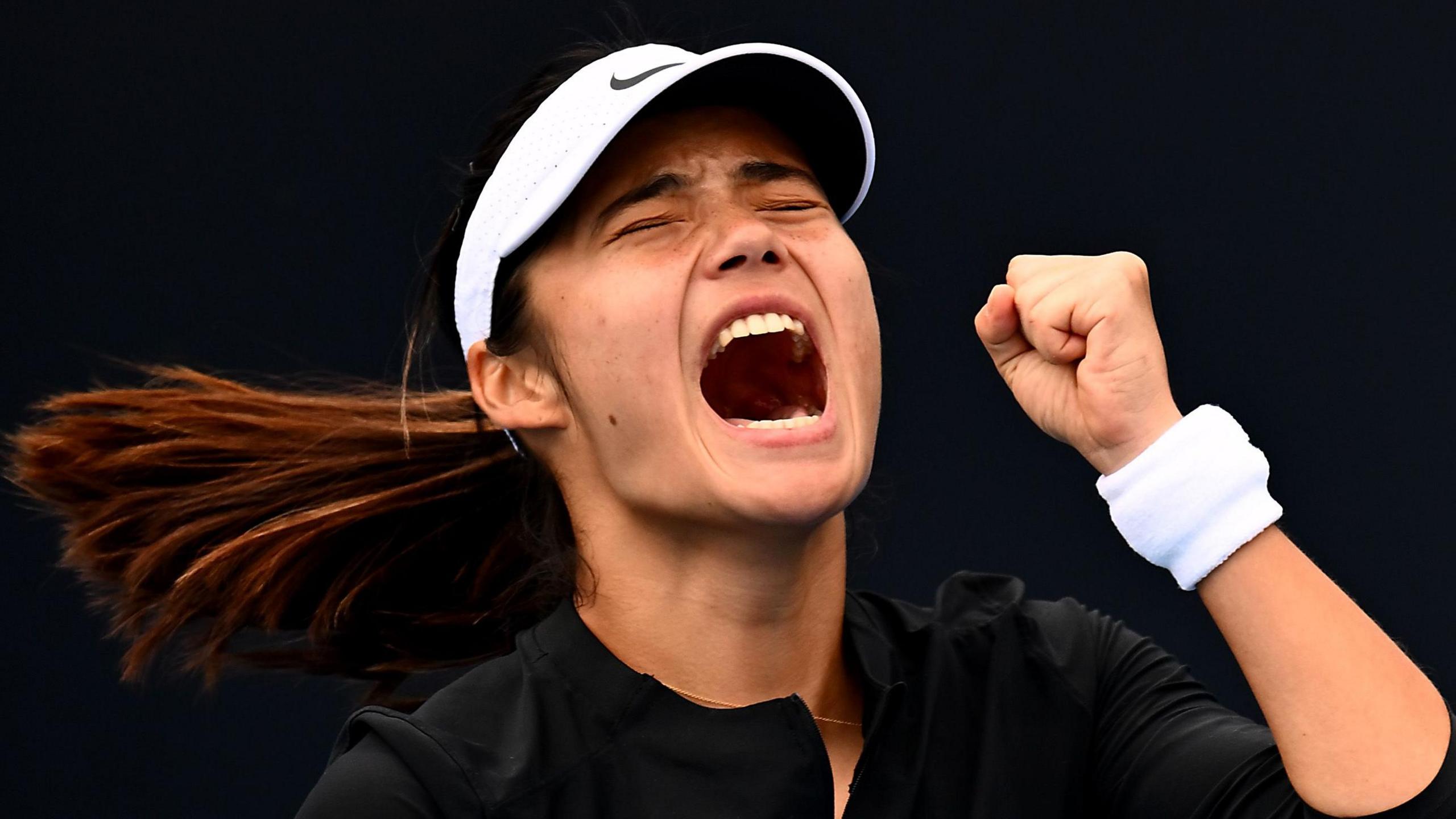 Raducanu earns first win of season after rain delay