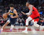 Watson scores 24 points as Nuggets hold off Raptors to win 106-103 without the injured Jokic
