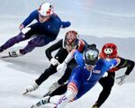 GB's Treacy crashes out but curlers' hopes stay alive