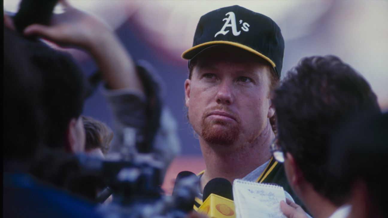 McGwire back with A's, this time as special asst.