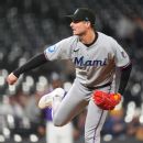 Pauley, up for Marlins 3B starter job, shut down