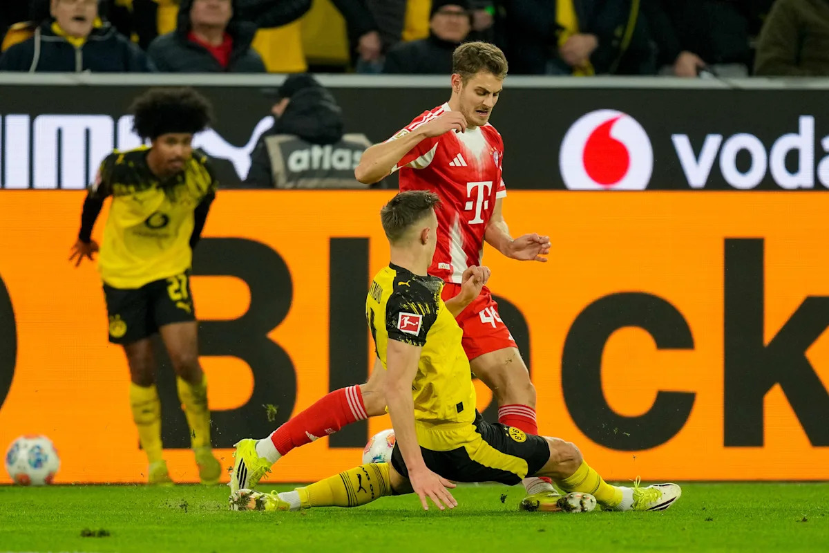 Josip Stanišić fumes over Nico Schlotterbeck tackle during Bayern Munich 3-2 win over Borussia Dortmund